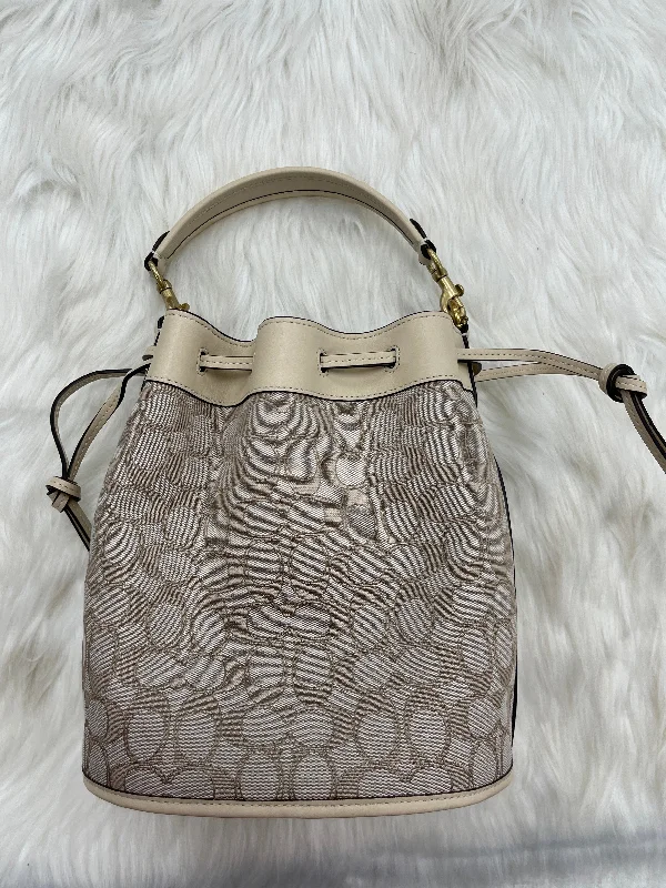 Coach Dempsey bags with a large capacity and a drawstring closureHandbag Designer By Coach  Size: Small